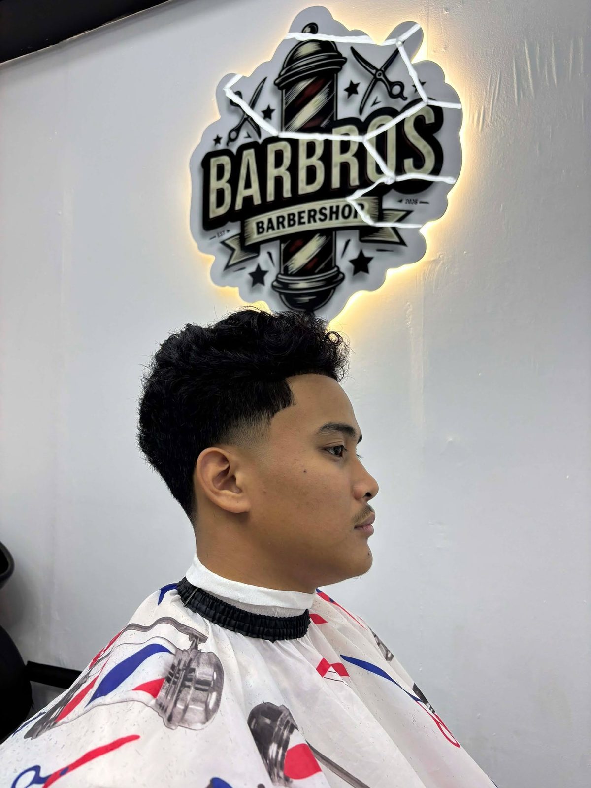 Barbrs Barbershop backlit logo