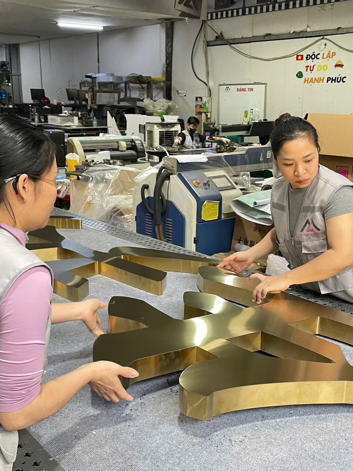 Team finishing brushed-gold letters
