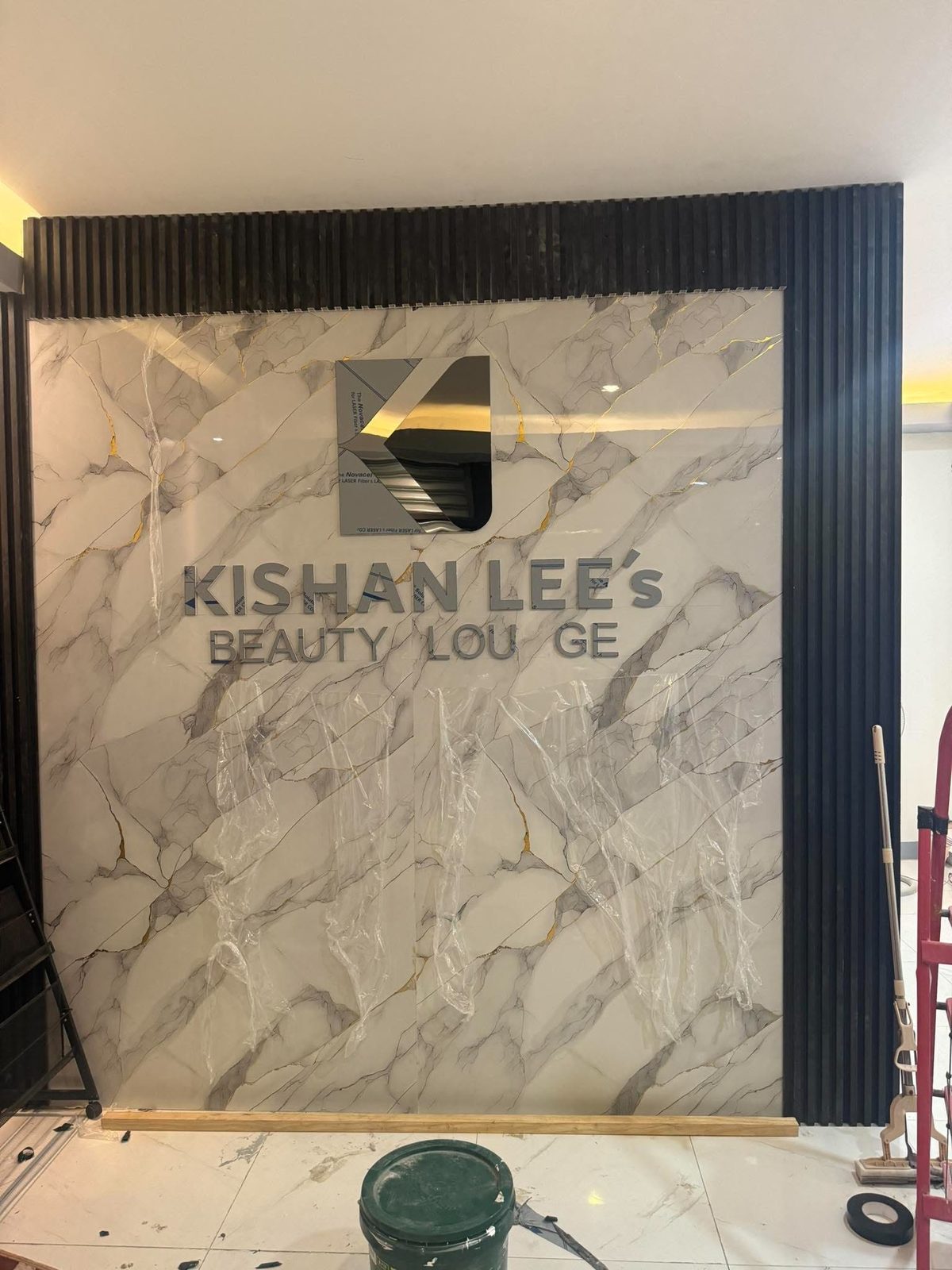 Kishan Lee's Beauty Lounge — marble wall